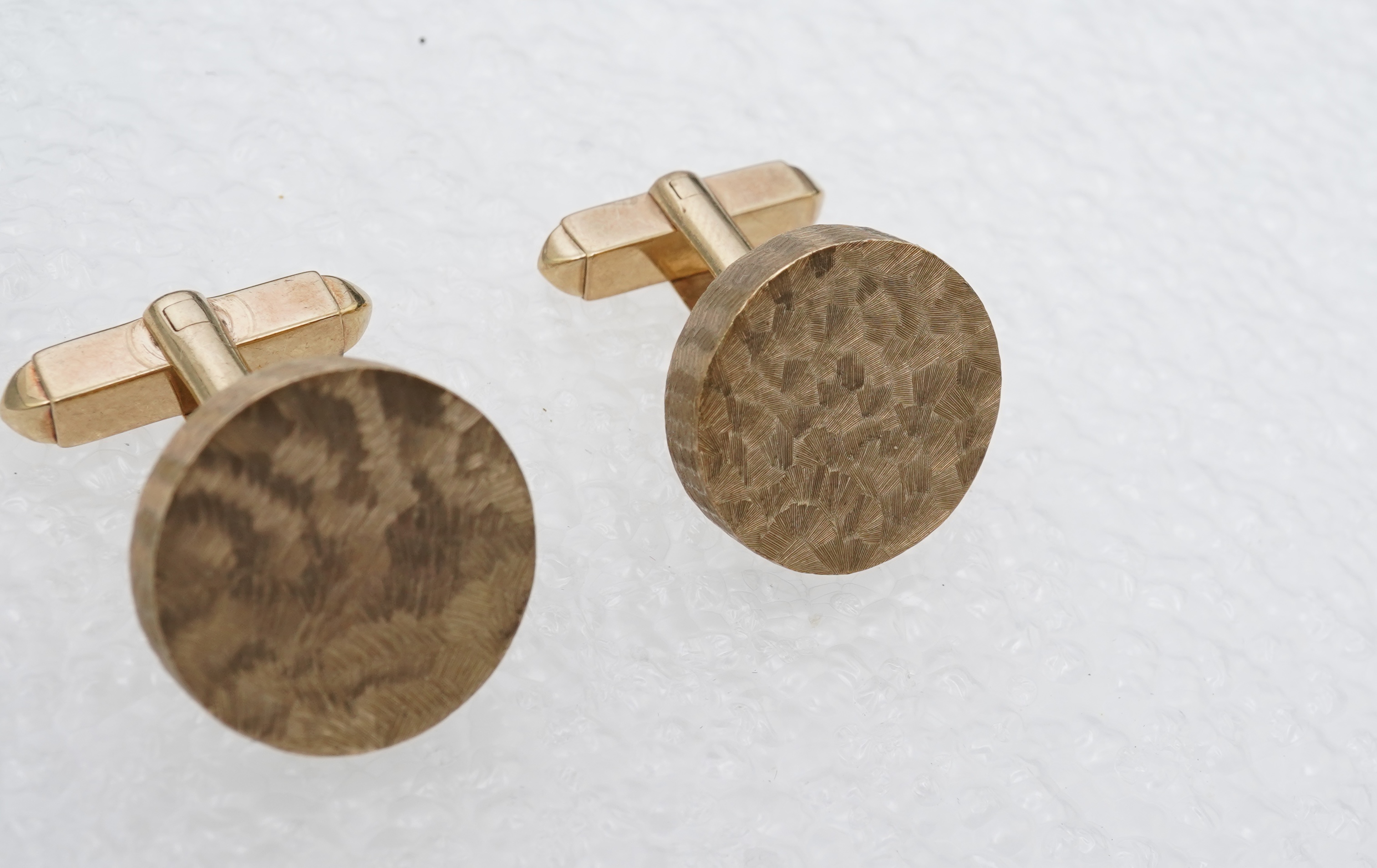 A pair of gold cufflinks, circa 1964